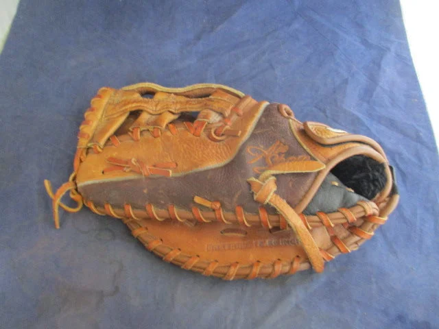 Baseball glove and helmet setsUsed Nike Air Show Elite 12.5" First Base Glove - LHT